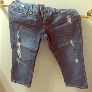 Ripped jeans, capris length. Juicy Couture